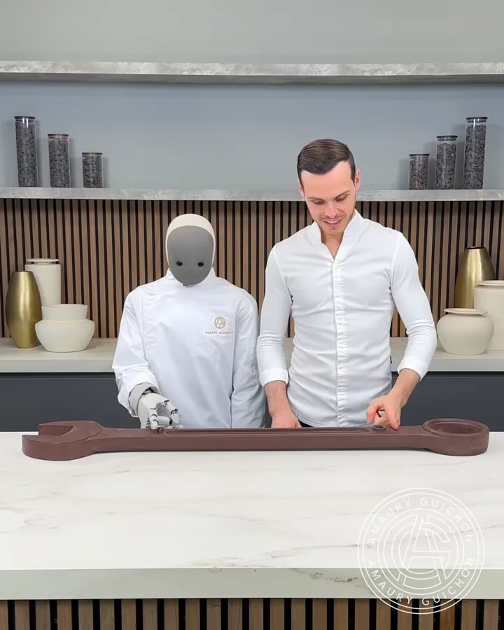 Watch: 1X NEO and Star Chef Amaury Guichon Collaborate on a Surprising ''Tech'' Cake