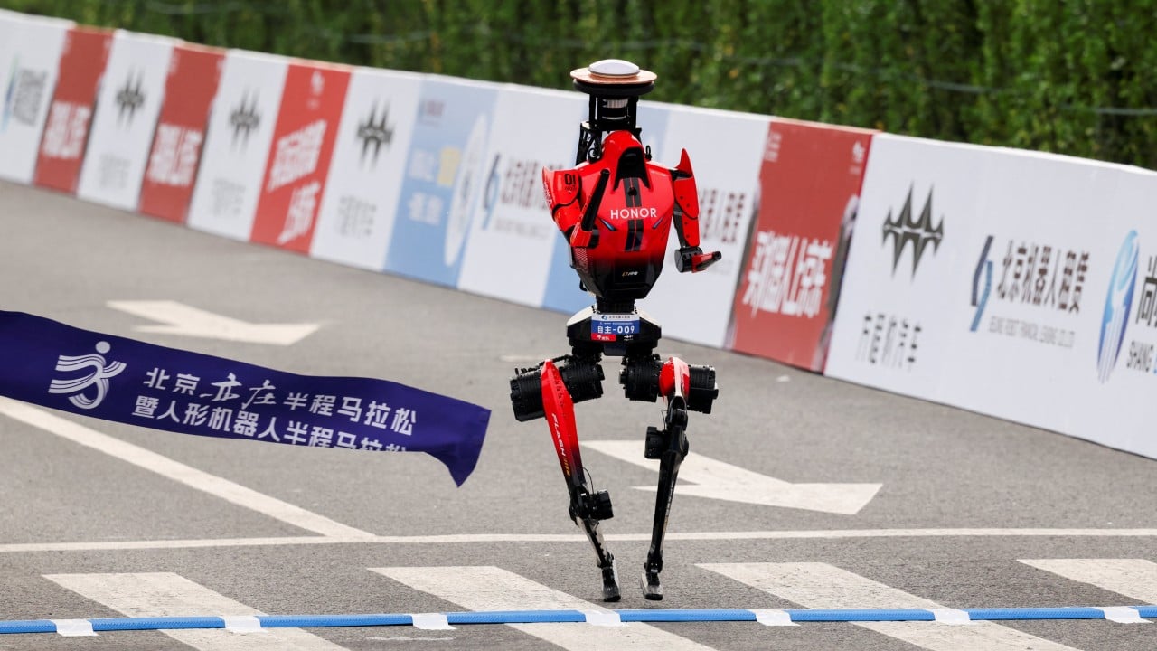 Winner of Beijing robot half-marathon smashes human world record by 6 minutes