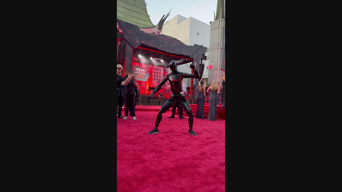 Custom Tesla Optimus Makes Red Carpet Debut at "Tron: Ares" Premiere
