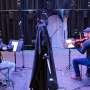 Wearable robots improve coordination between pairs of violin players