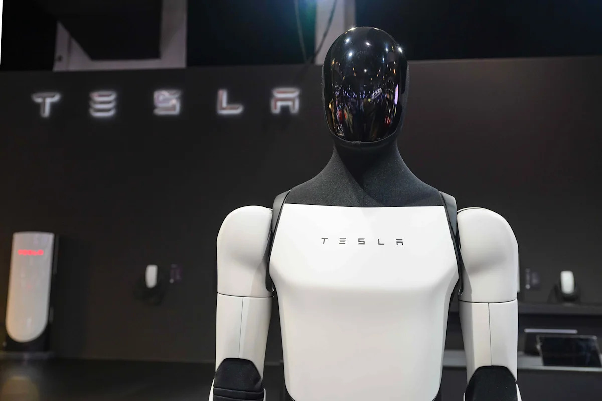 Alphabet Surpasses Expectations While Tesla's Profits Fall Short Amid AI Spending Surge