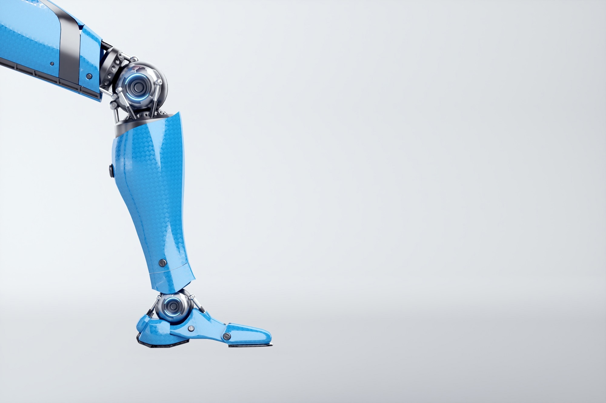 Human-Inspired Hip Motion Reduces Biped Robot Walking Energy Consumption by 14%