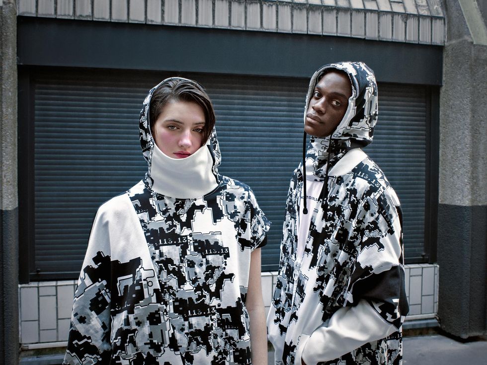 Adversarial Fashion Challenges Surveillance Norms with Innovative Designs