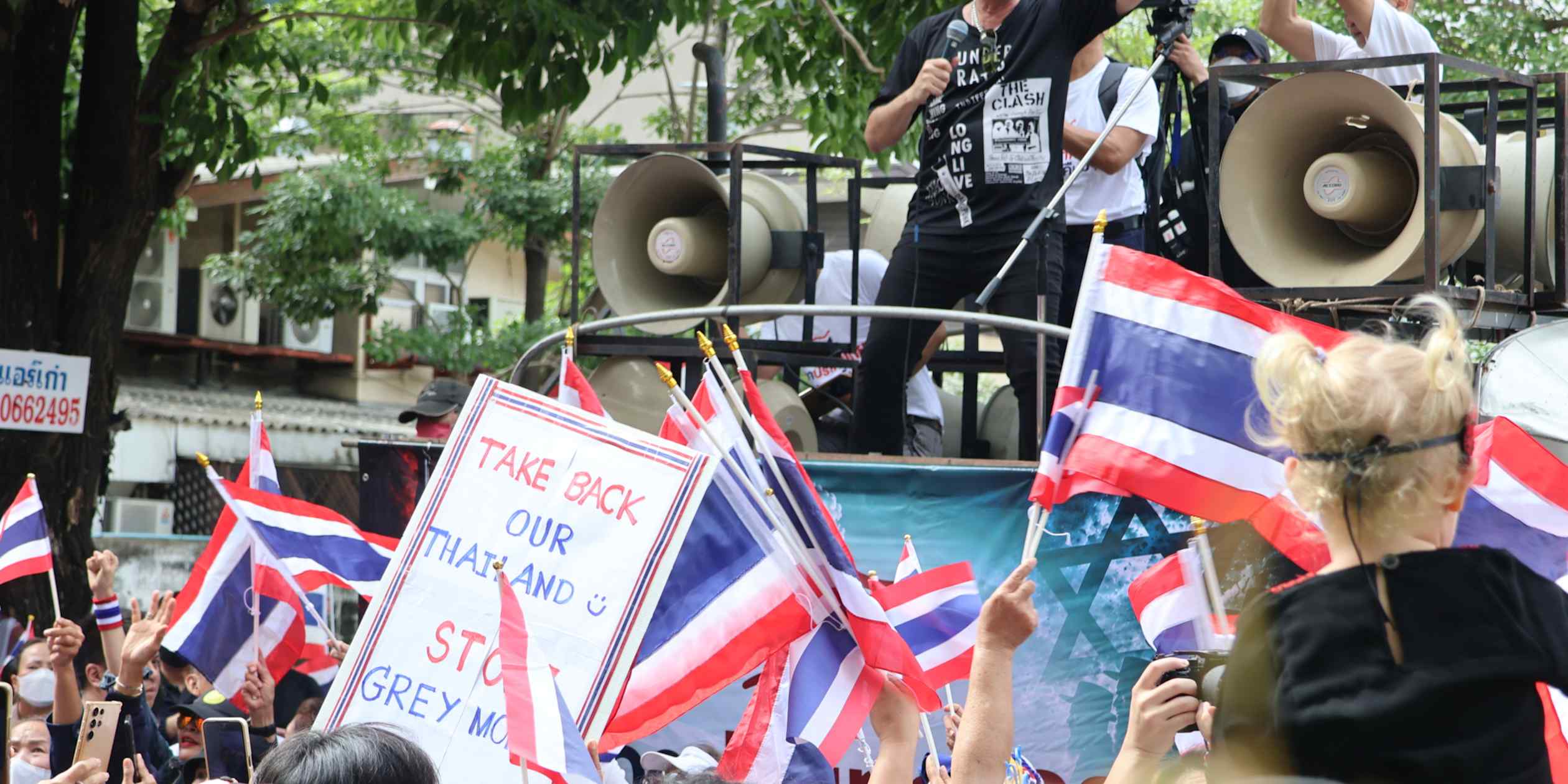 Thai Activists Protest Against Foreign Companies Amid Economic Slowdown